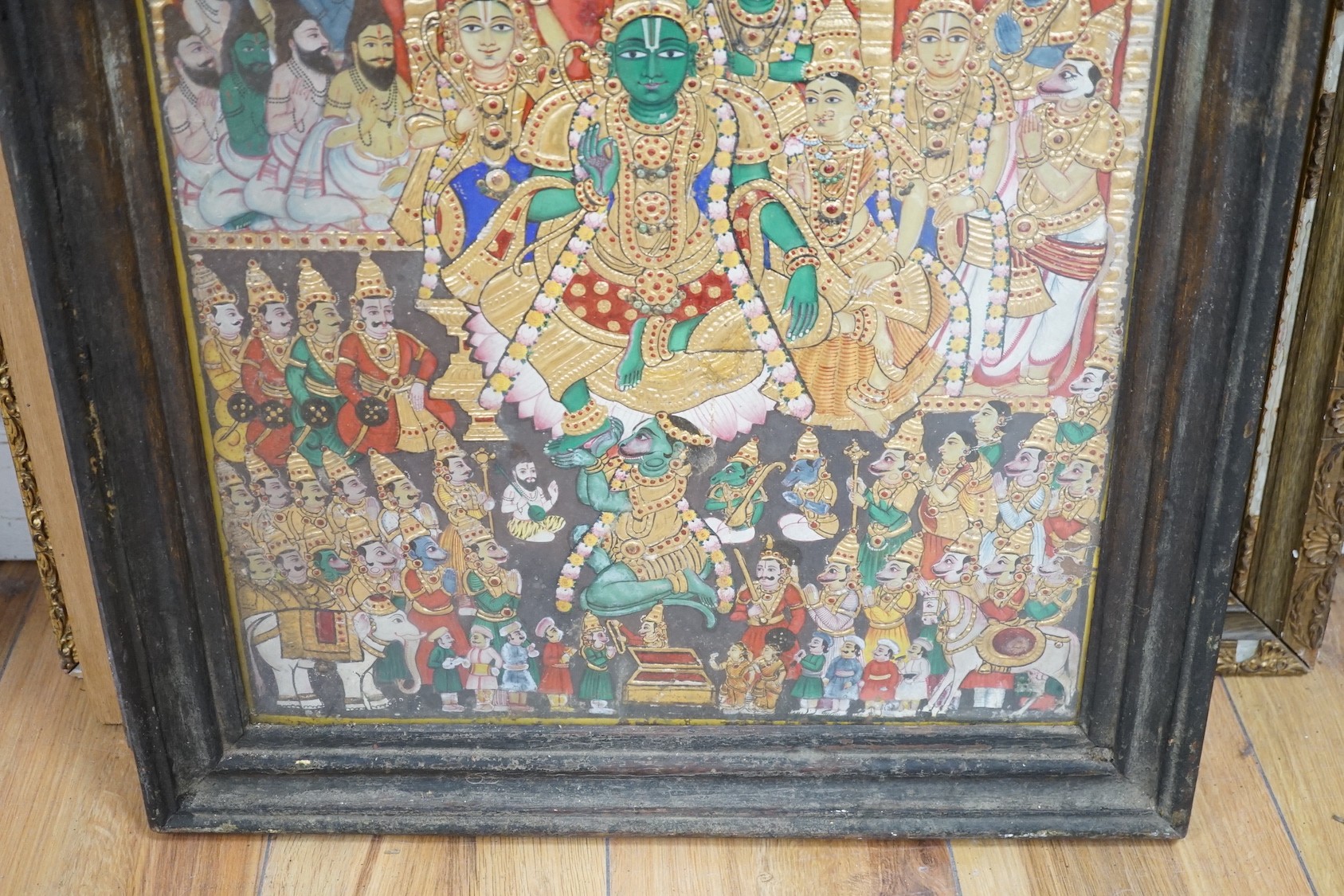 Indian School, eight assorted reverse paintings on glass, Studies of nobles, deities and other figures, largest 60 x 44cm